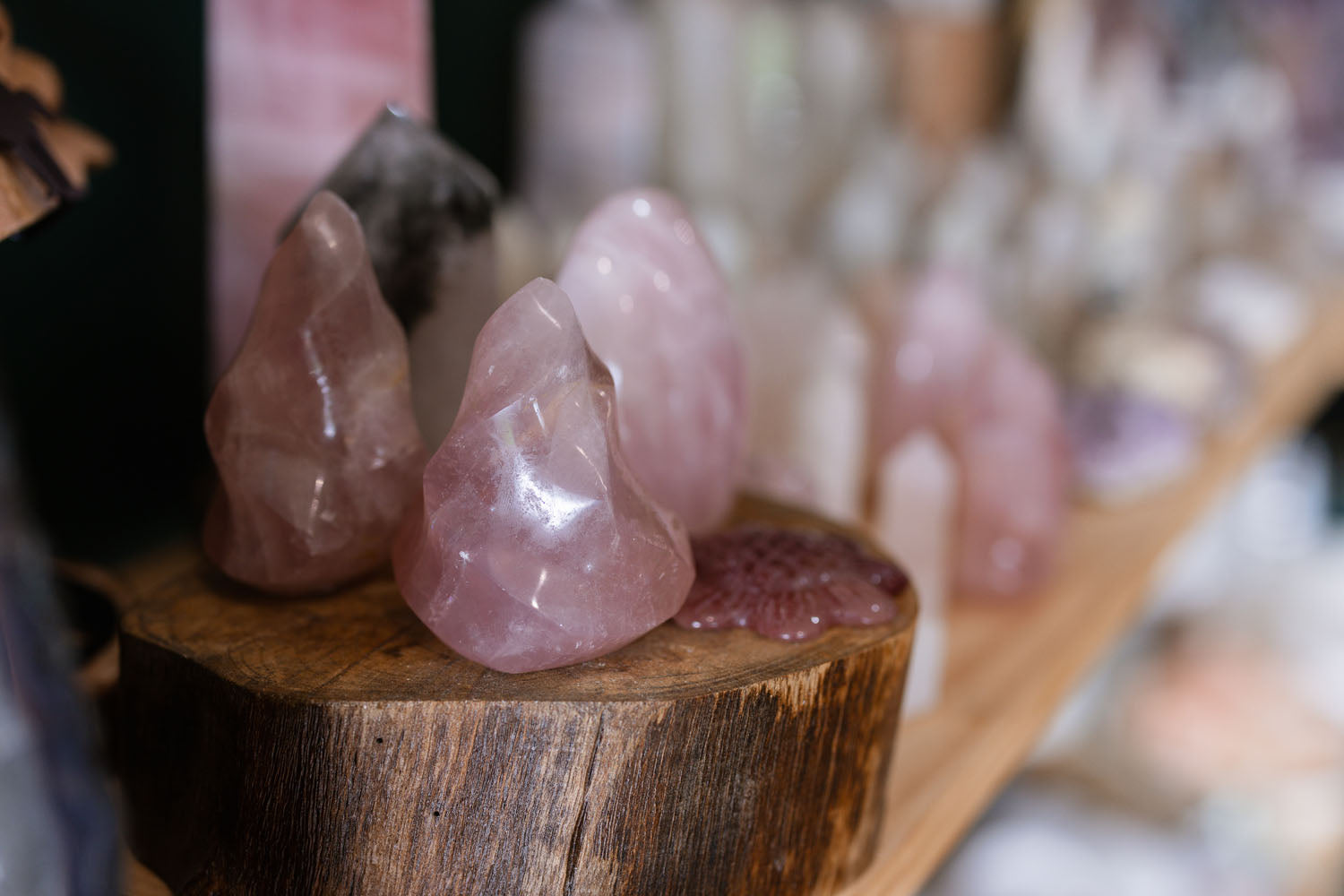 Wood block slice with organic-shaped purple crystals on top