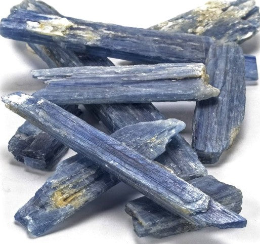 Blue Kyanite Blade Crystalline forms displayed on a white background