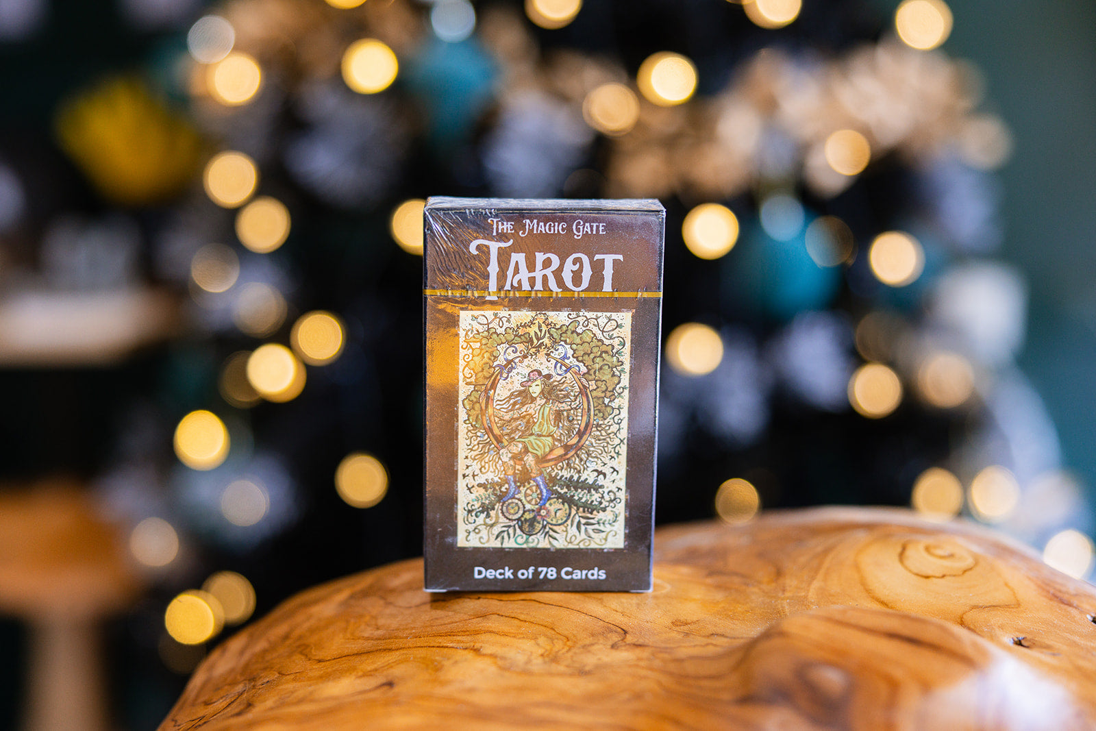 Tarot cards Magic Gate Tarot Deck displayed on a wooden surface