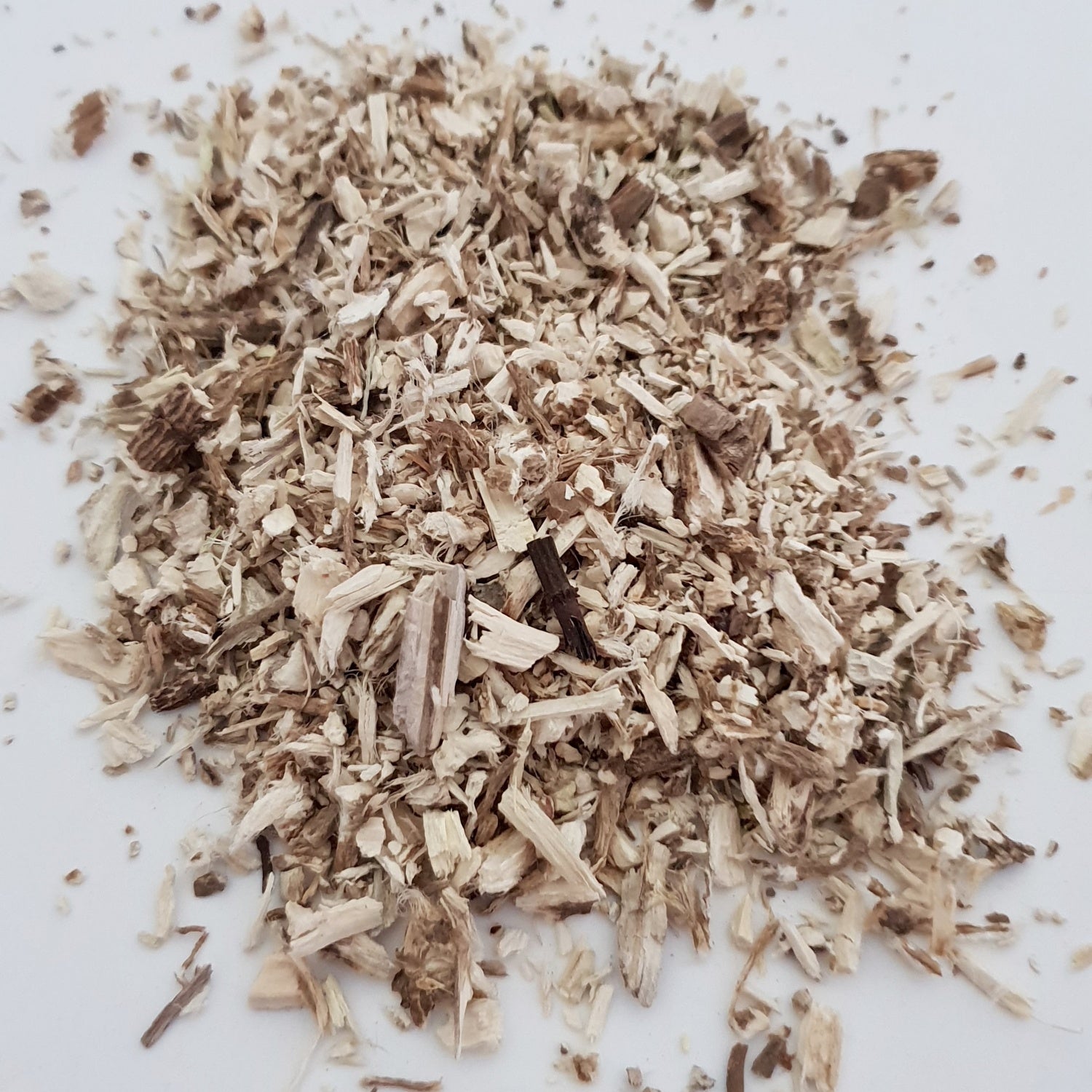 Marshmallow Root herb on a white surface.