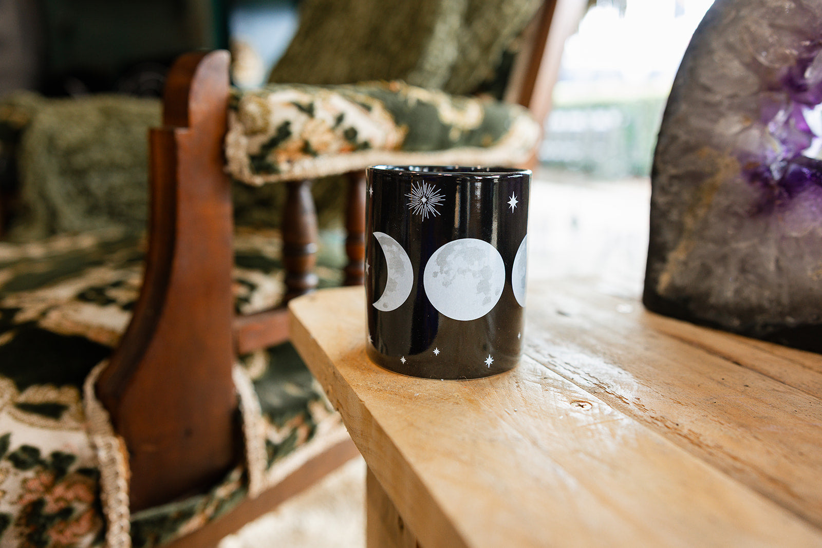 Moon Phase Mug on a wooden tabletop 