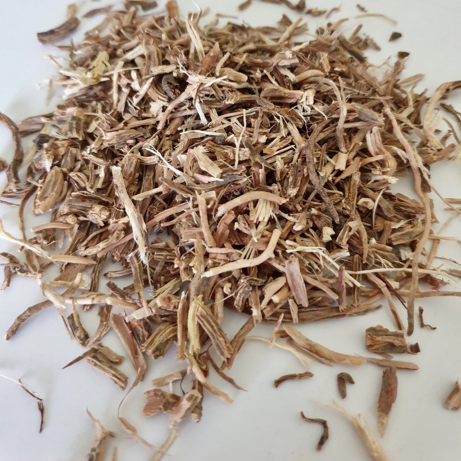 Sarsaparilla Root herb on a white surface.