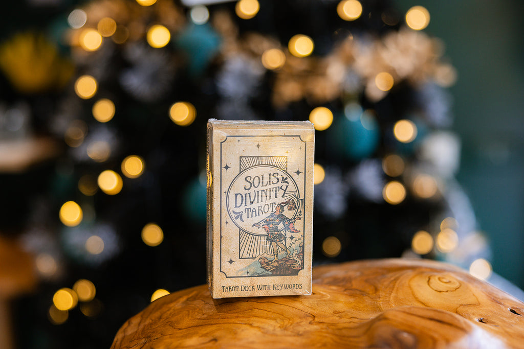 Solis Divinity - Vintage Tarot Deck displayed on a wooden surface