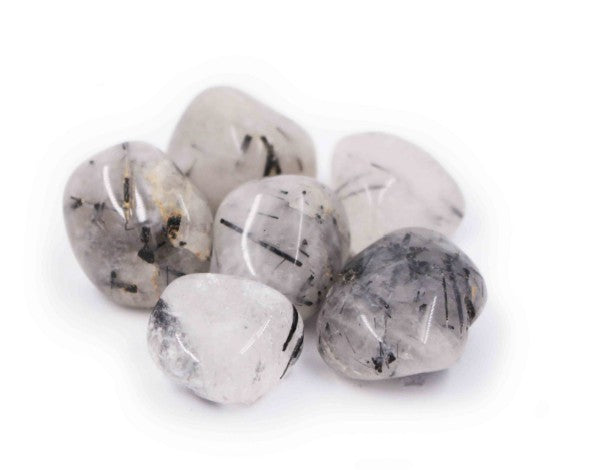 group of Tourmaline in Quartz Tumbles on white background